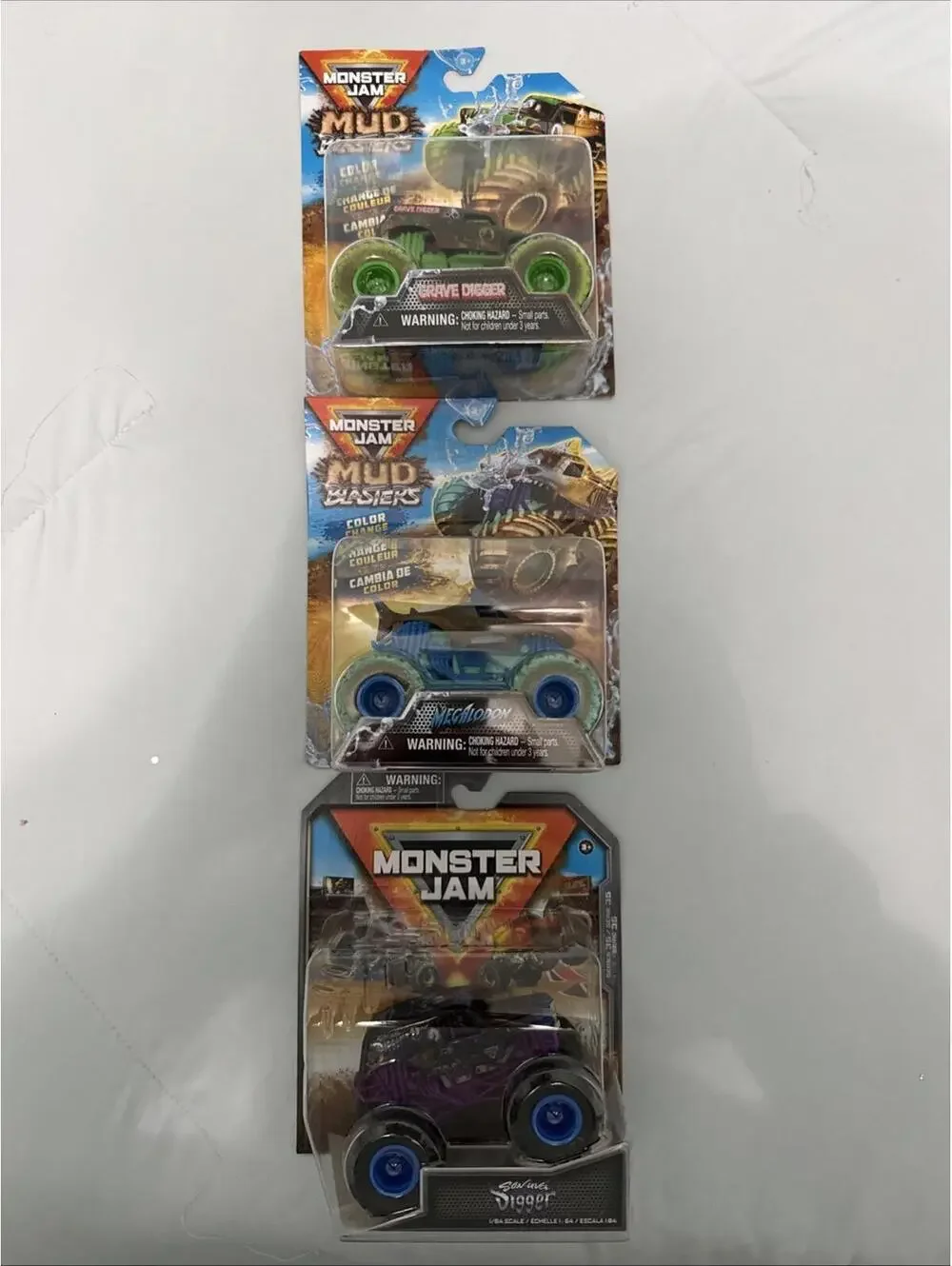 Lot of 3 2025 Spin Master Monster Jam Mud Blasters Megalodon Grave Digger & Son
